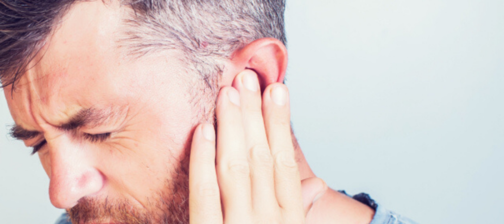Man with Tinnitus Ear Ringing